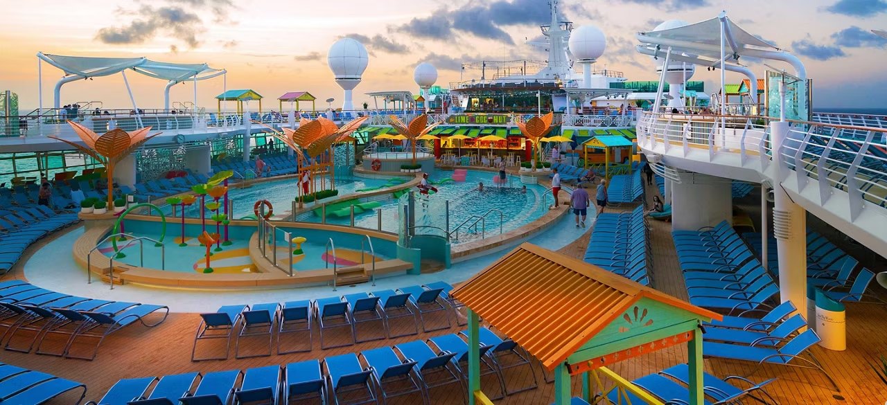 Navigator of the Seas pool deck at sunset